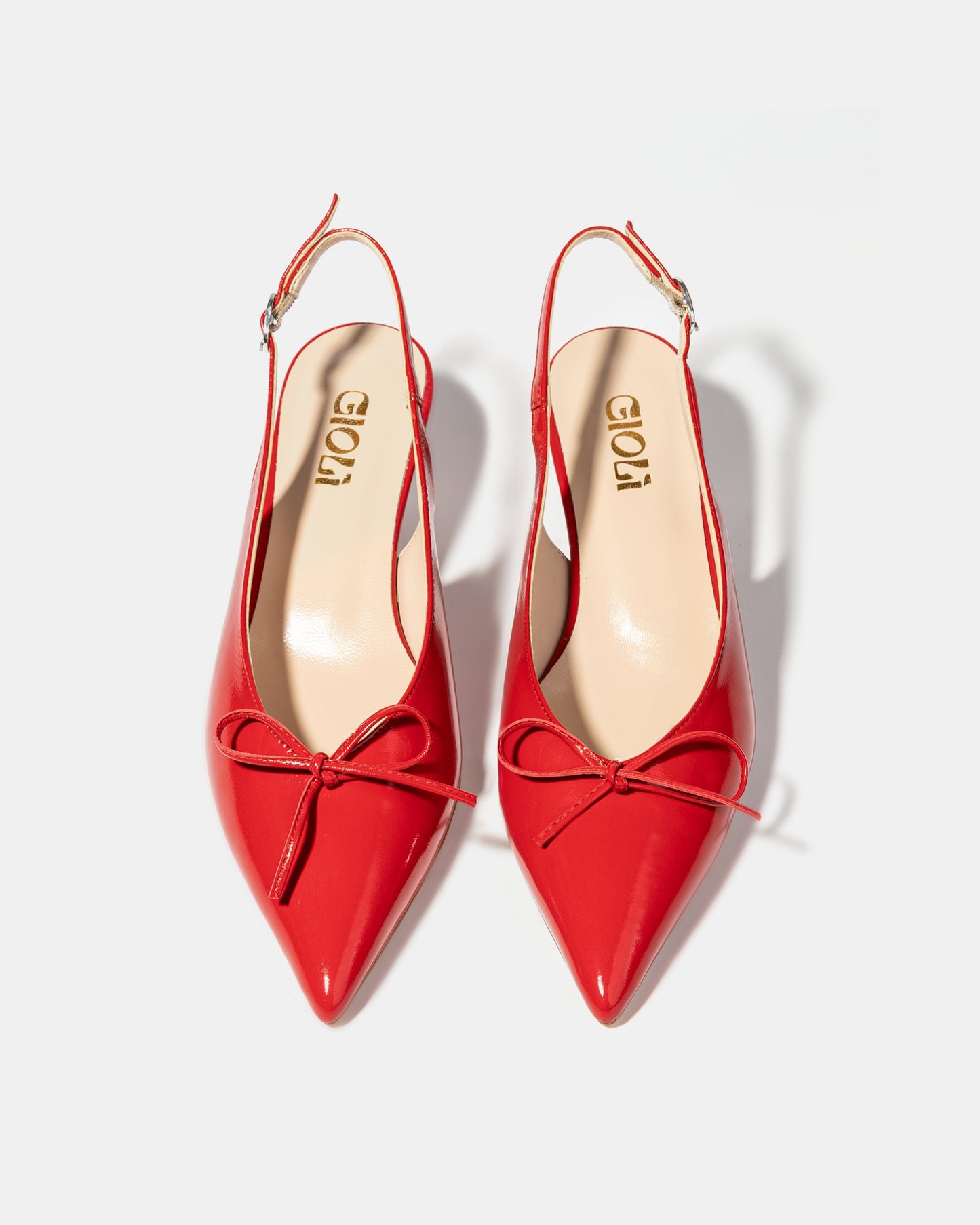 Bow slingback pump