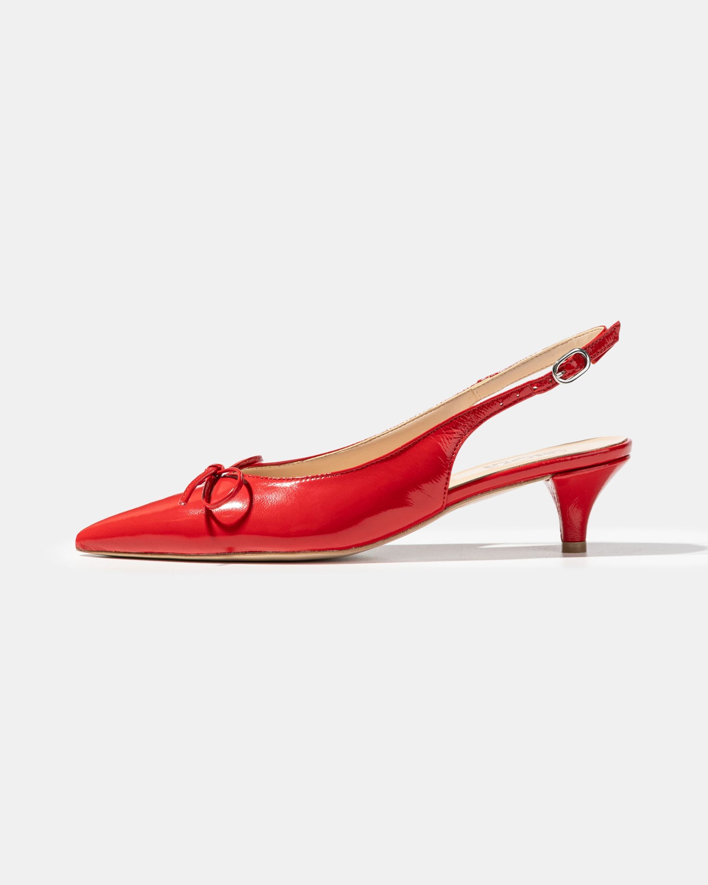 Bow slingback pump