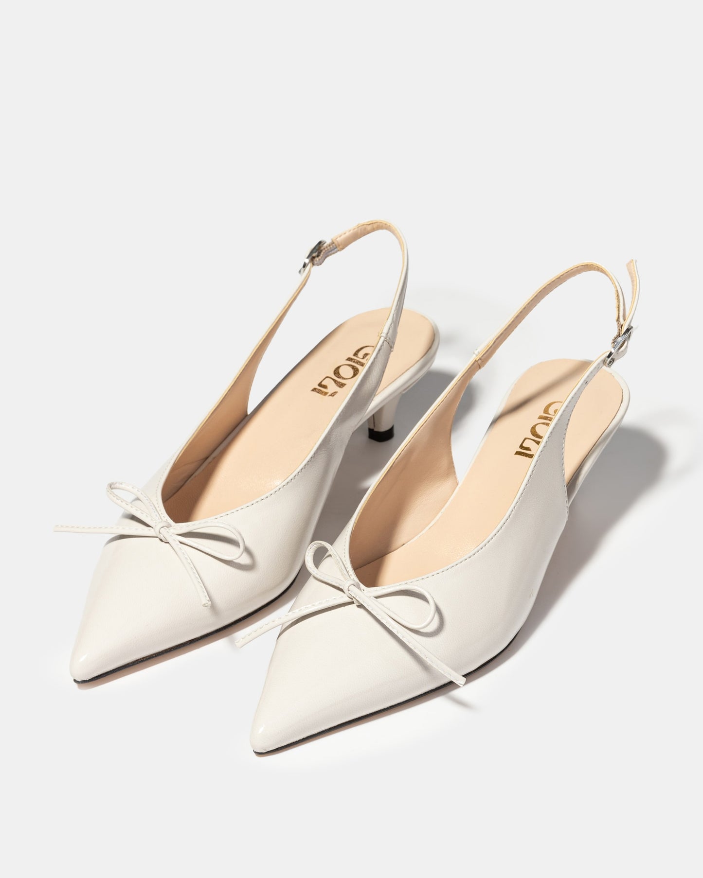 Bow slingback pump