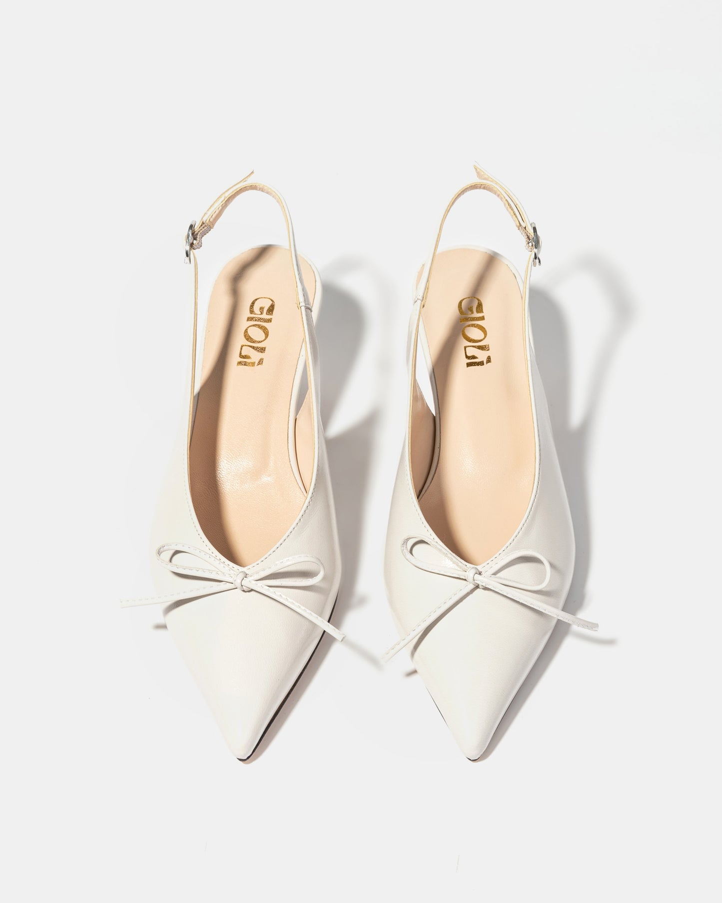 Bow slingback pump