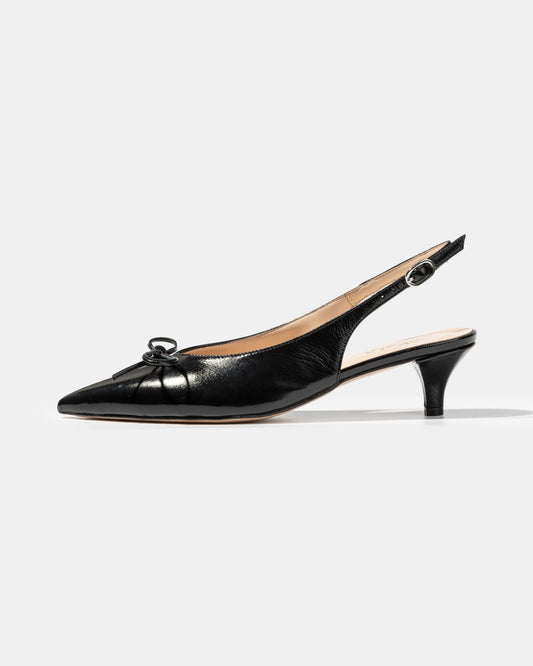 Bow slingback pump