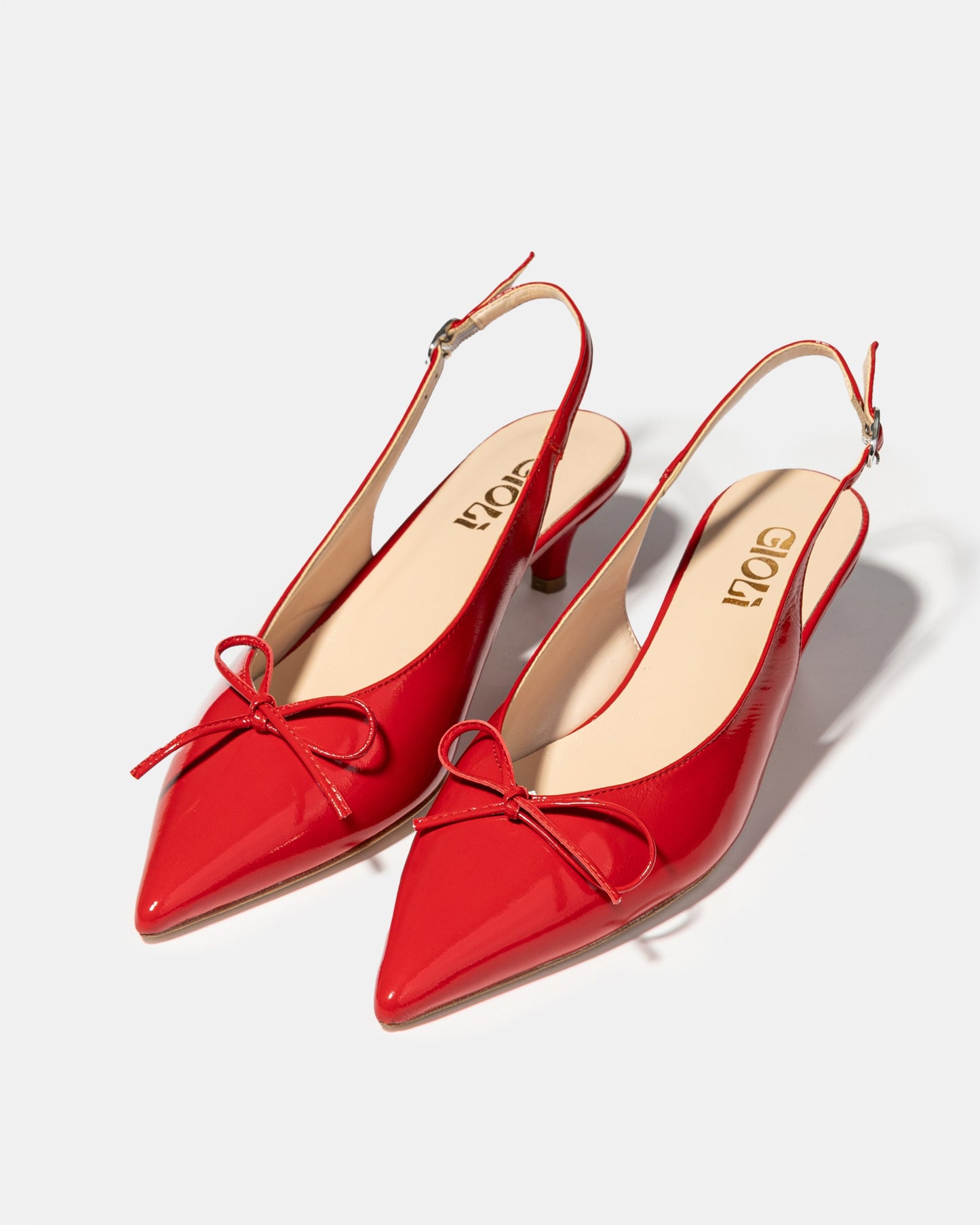 Bow slingback pump